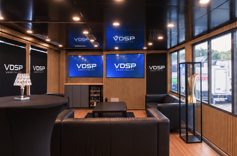 Lounge seating facing the screen wall